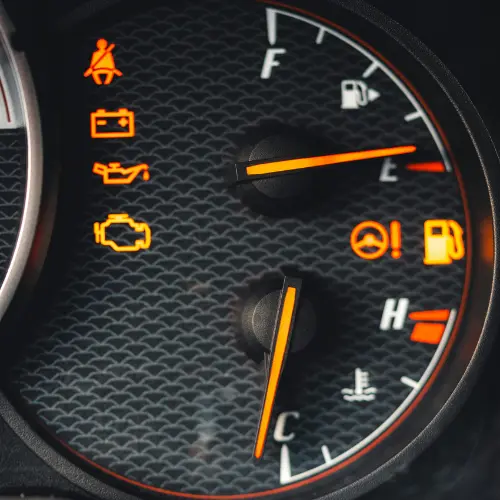 Photo by Erik Mclean: https://www.pexels.com/photo/pictographs-on-dashboard-in-car-16341407/